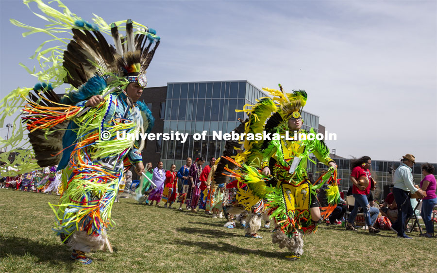Douglas Scholfield (left) and Max Sevier dance in the men's fancy competition during the April 23 UNITE powwow. The event drew hundreds to campus. 2022 UNITE powwow to honor graduates (K through college). Held April 23 on the greenspace along 17th Street, immediately west of the Willa Cather Dining Center. This was UNITE’s first powwow in three years. The MC was Craig Cleveland Jr. Arena director was Mike Wolfe Sr. Host Northern Drum was Standing Horse. Host Southern Drum was Omaha White Tail. Head Woman Dancer was Kaira Wolfe. Head Man Dancer was Scott Aldrich. Special contest was a Potato Dance. April 23, 2023. Photo by Troy Fedderson / University Communication.